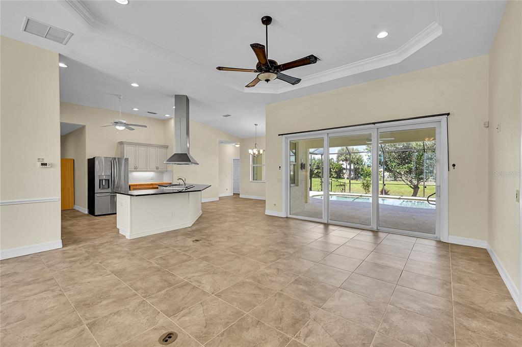233 Fairway Road Rotonda West, FL 33947 - Photo 3 of 63 a view of a kitchen with a sink and a window