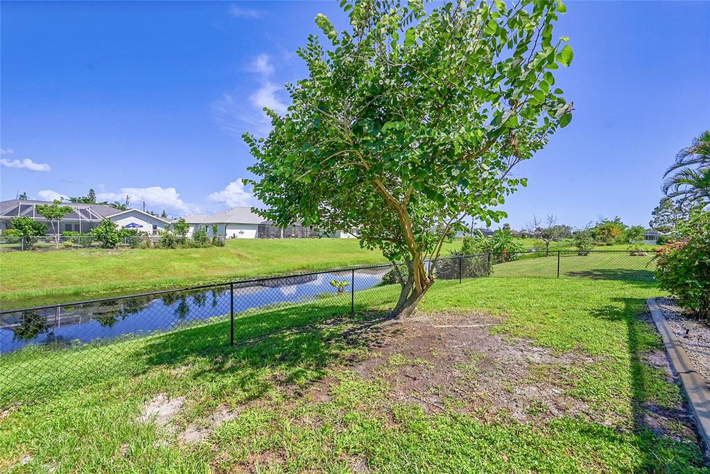 233 Fairway Road Rotonda West, FL 33947 - Photo 48 of 63 a view of a park with large trees