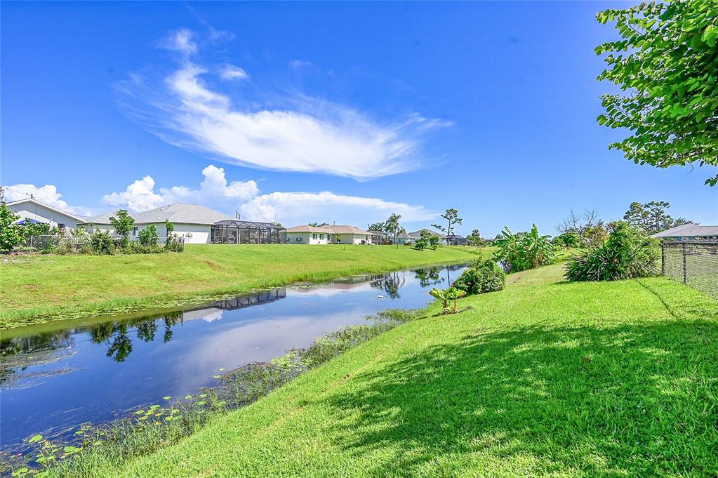 233 Fairway Road Rotonda West, FL 33947 - Photo 50 of 63 a view of a golf course with an ocean
