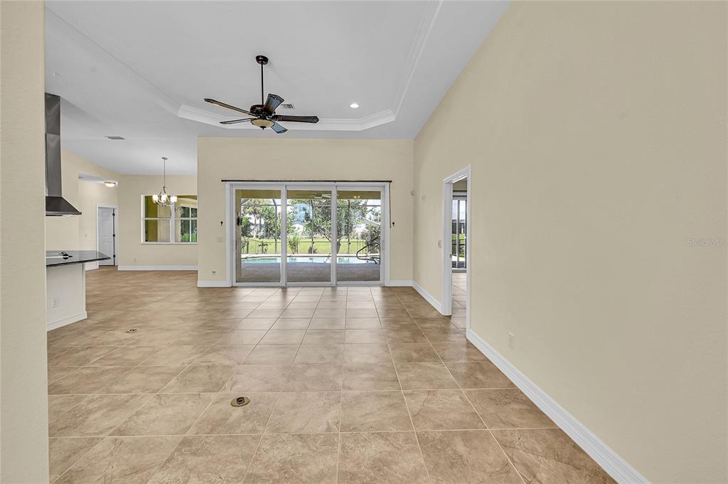 233 Fairway Road Rotonda West, FL 33947 - Photo 8 of 63 a view of an empty room with a window