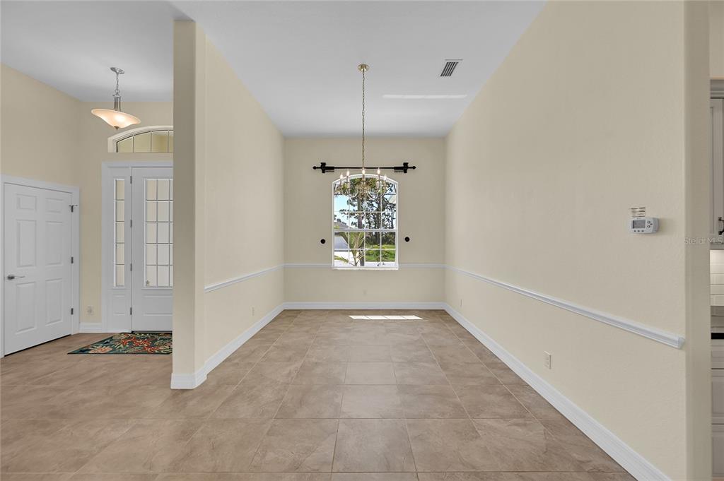 233 Fairway Road Rotonda West, FL 33947 - Photo 10 of 63 an empty room with windows and closet