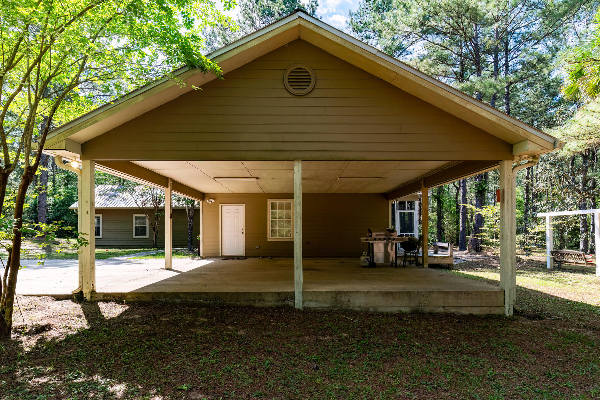 4353 Poverty Creek Road Crestview, FL 32539 - Photo 11 of 43 a front view of a house with a yard
