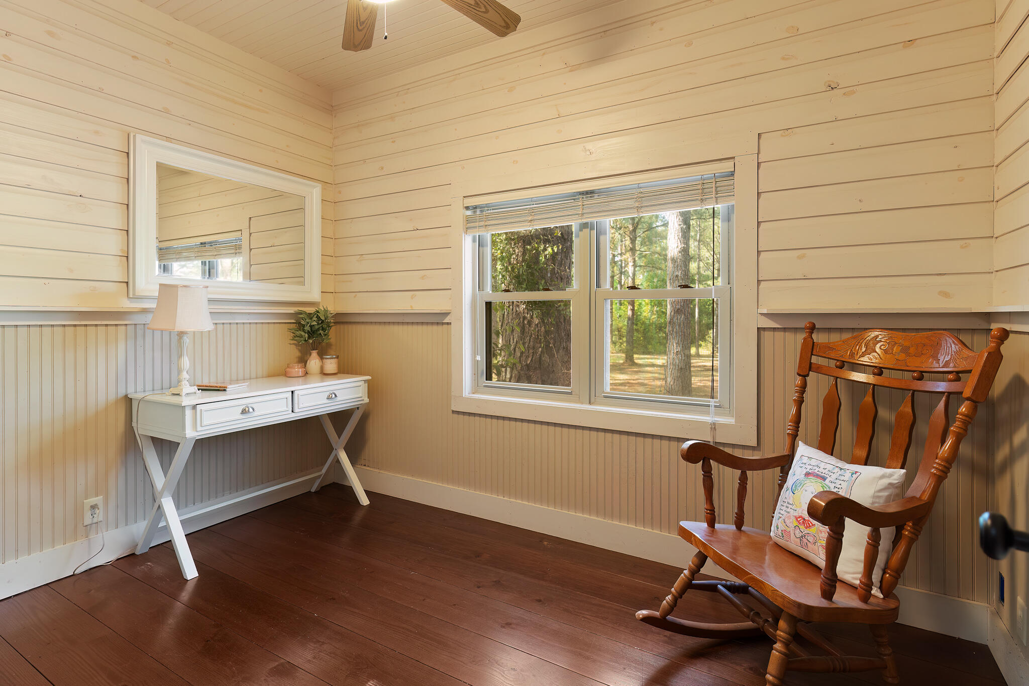 4353 Poverty Creek Road Crestview, FL 32539 - Photo 27 of 43 a view of a workspace with wooden floor and a window
