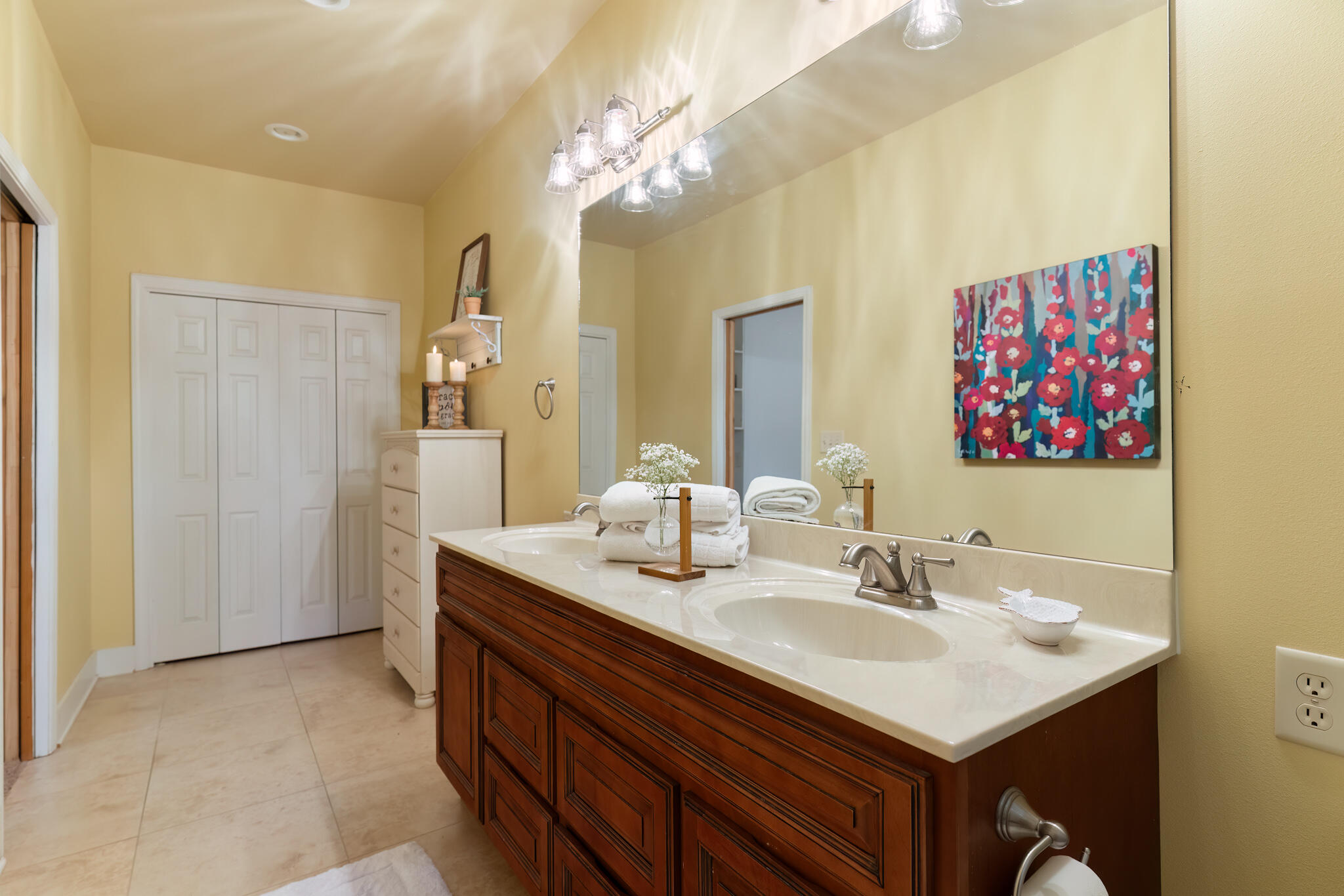 4353 Poverty Creek Road Crestview, FL 32539 - Photo 33 of 43 a bathroom with a sink vanity and a mirror