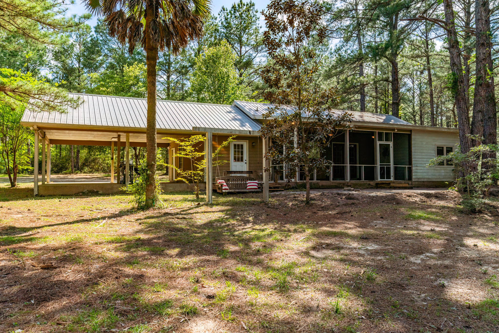 4353 Poverty Creek Road Crestview, FL 32539 - Photo 4 of 43 front view of a house with a tree