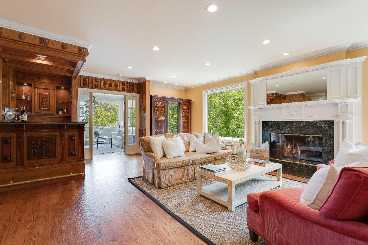 843 Chiltern Road Hillsborough, CA 94010 - Photo 16 of 94 a living room with fireplace furniture and a wooden floor