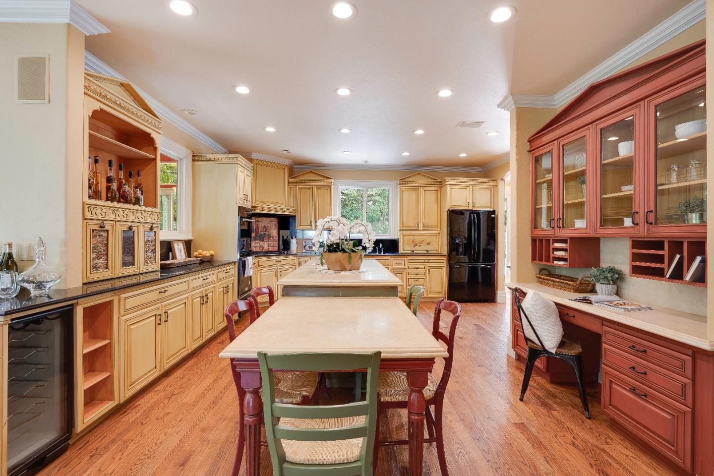 843 Chiltern Road Hillsborough, CA 94010 - Photo 20 of 94 a large kitchen with a table and chairs