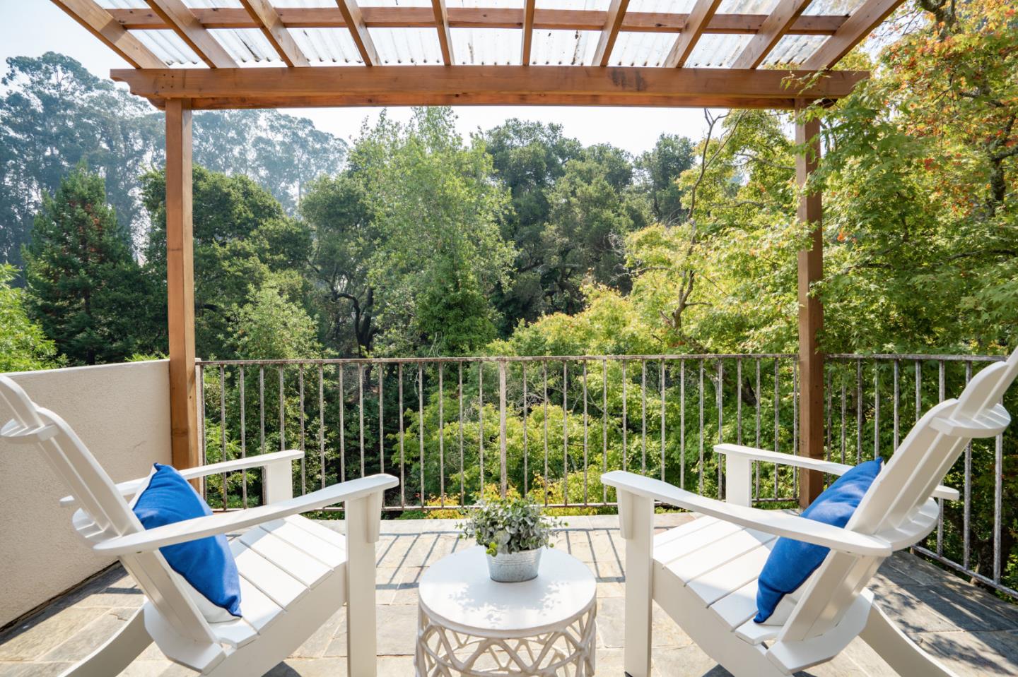 843 Chiltern Road Hillsborough, CA 94010 - Photo 48 of 94 a view of a patio with a table chairs and a table