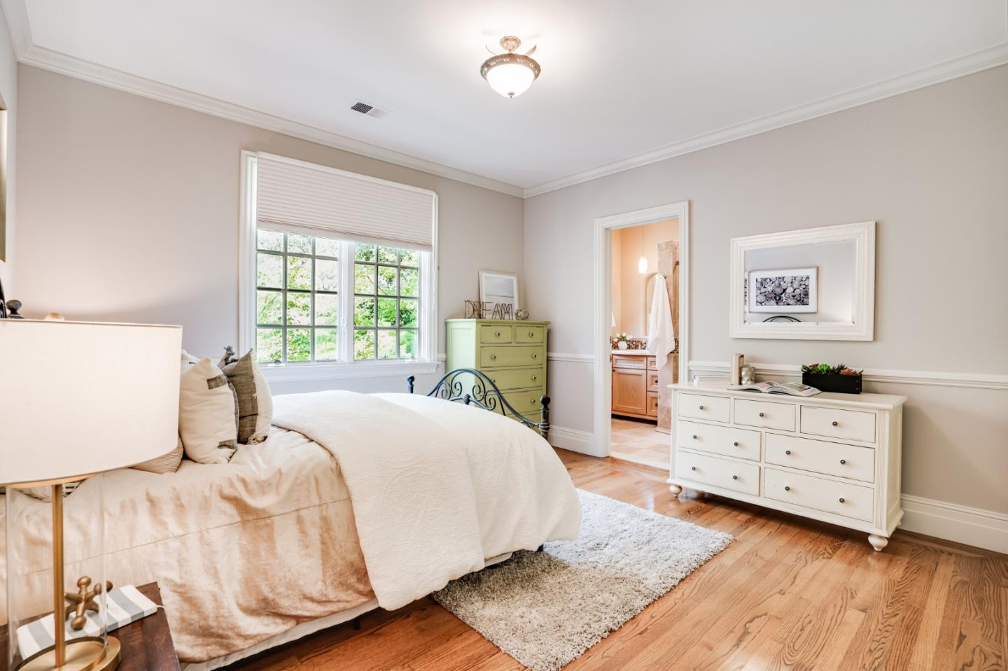 843 Chiltern Road Hillsborough, CA 94010 - Photo 59 of 94 a bedroom with a bed and window