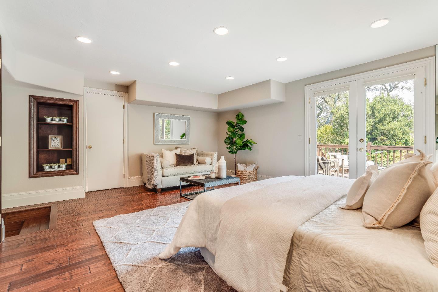 843 Chiltern Road Hillsborough, CA 94010 - Photo 67 of 94 a spacious bedroom with a large bed and furniture