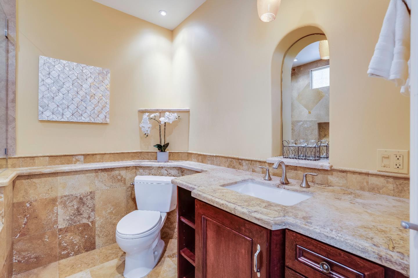 843 Chiltern Road Hillsborough, CA 94010 - Photo 72 of 94 a bathroom with a granite countertop sink and a mirror