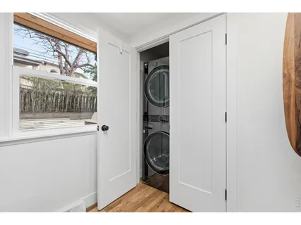a view of a closet and utility room