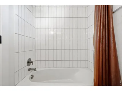 a bathroom with a bathtub