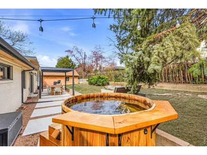 a view of a swimming pool with a patio