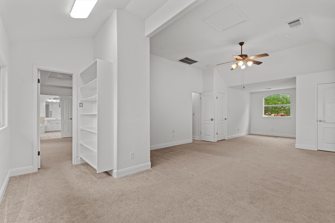 5724 Brittlyns Court Austin, TX 78730 - Photo 27 of 40 wooden floor in an empty room with a window