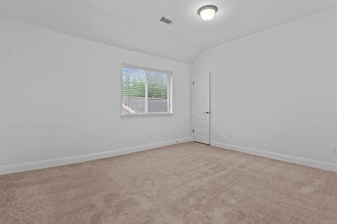 5724 Brittlyns Court Austin, TX 78730 - Photo 31 of 40 an empty room with windows