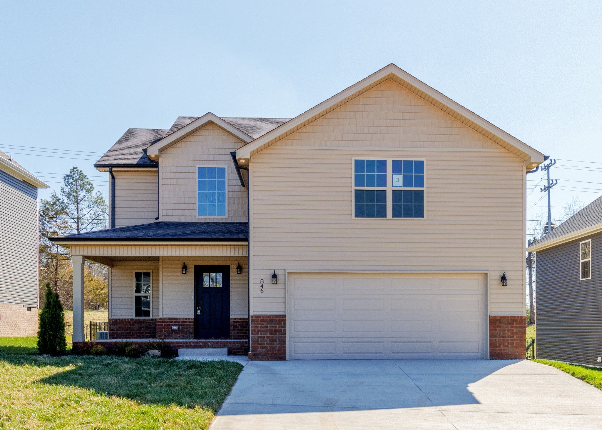 846 Limestone Way Clarksville, TN 37043 - Photo 1 of 30 a front view of a house with garden