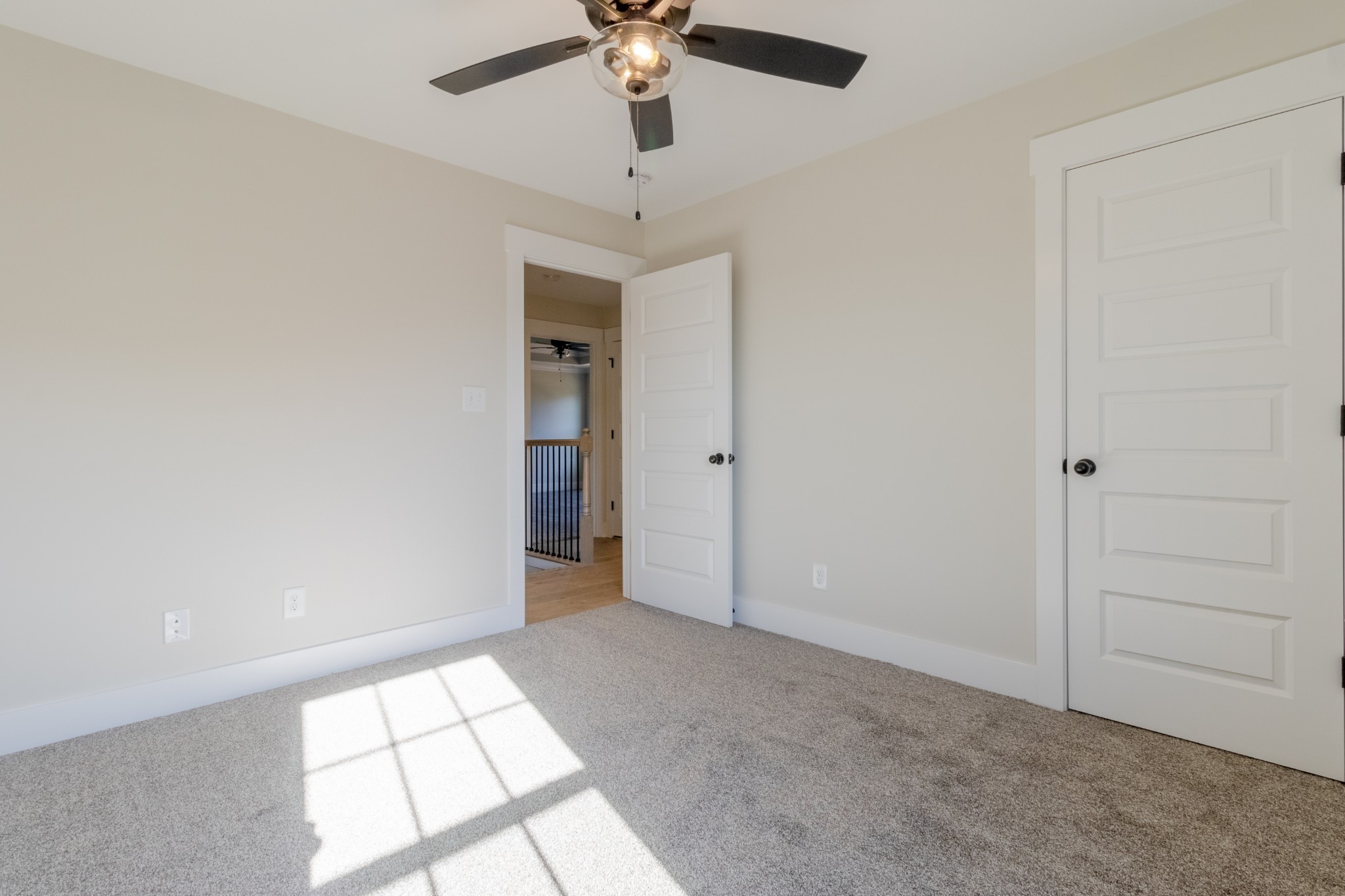 846 Limestone Way Clarksville, TN 37043 - Photo 22 of 30 wooden floor in an empty room with a window