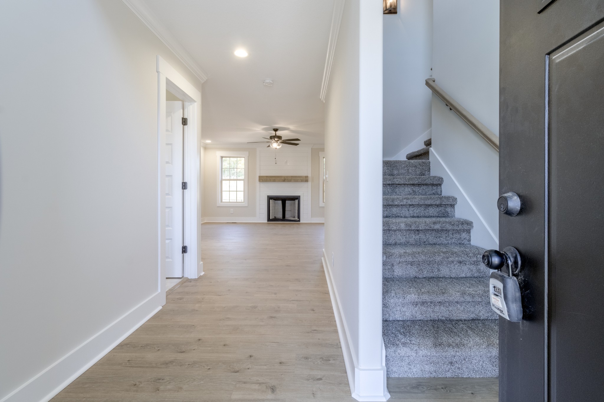 846 Limestone Way Clarksville, TN 37043 - Photo 4 of 30 a view of a hallway with a refrigerator and stove