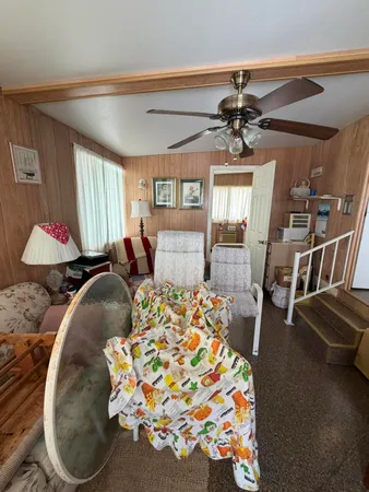 a bed room with a bed and a chandelier