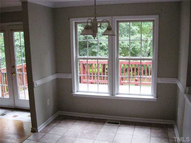 224 Crossfire Road Holly Springs, NC 27540 - Photo 7 of 7 a view of an empty room with a window