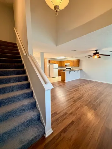 a view of an entryway and livingroom