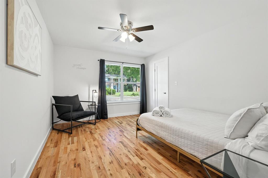 1009 Walnut Street Irving, TX 75060 - Photo 25 of 39 Bedroom with light wood-style floors and ceiling fan