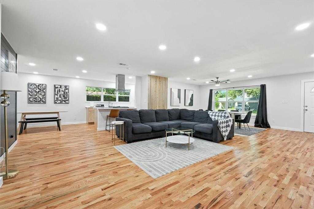 1009 Walnut Street Irving, TX 75060 - Photo 7 of 39 Living area with light wood-type flooring, healthy amount of natural light, and recessed lighting