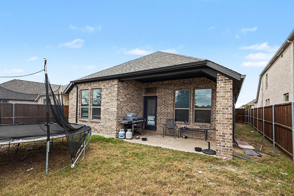 2208 Rothbury Drive Forney, TX 75126 - Photo 14 of 15 a house view with outdoor seating space