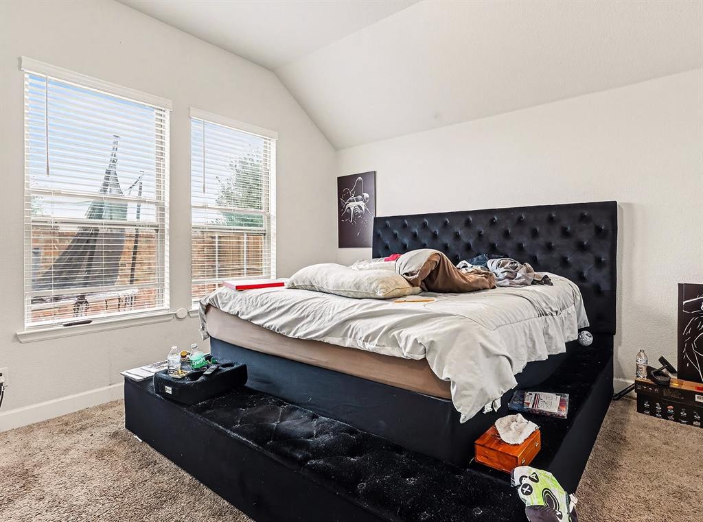 2208 Rothbury Drive Forney, TX 75126 - Photo 7 of 15 a bedroom with bed and window