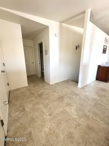 an empty room with window