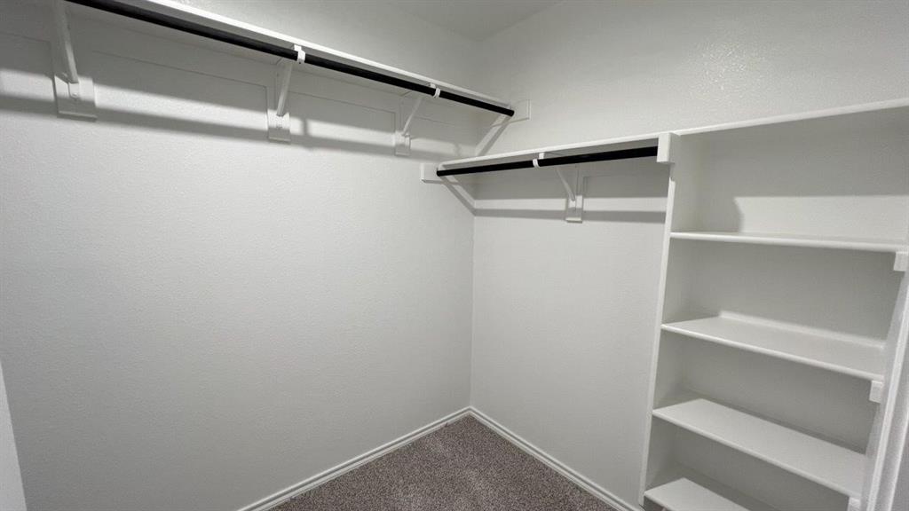 829 Round Robin Lane Rhome, TX 76078 - Photo 10 of 27 a view of an empty walk in closet