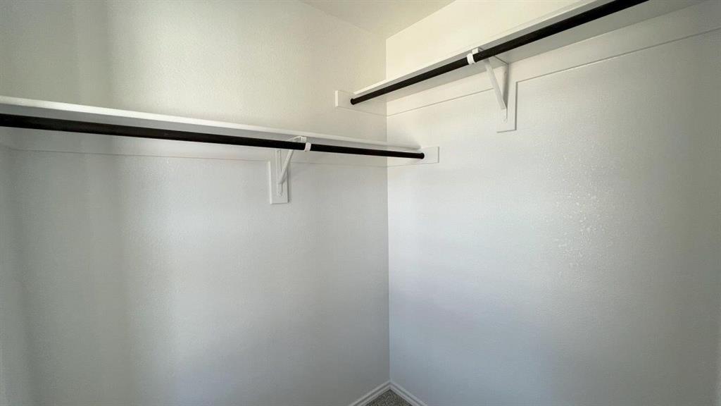 829 Round Robin Lane Rhome, TX 76078 - Photo 12 of 27 a view of a rack on the wall