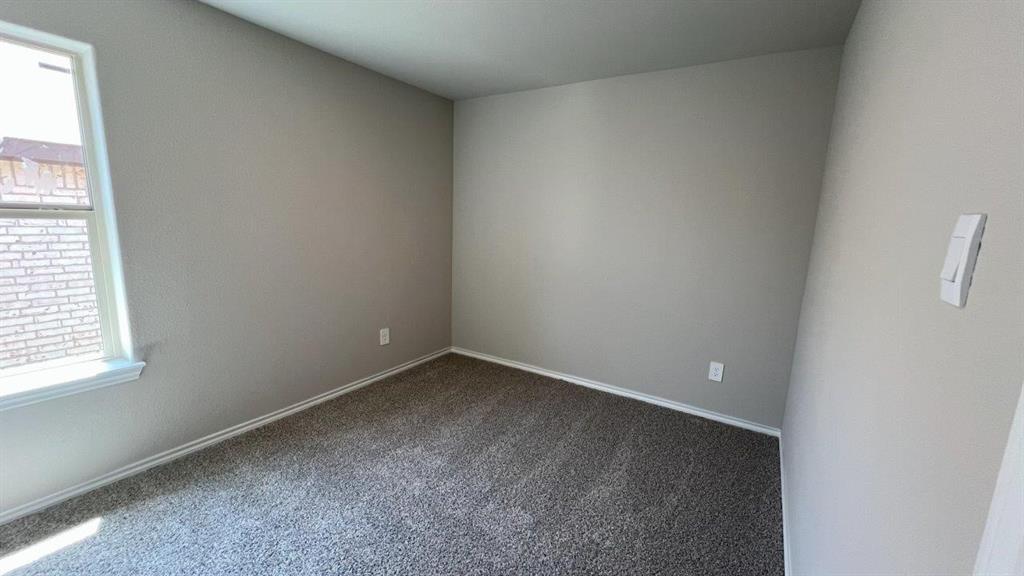 829 Round Robin Lane Rhome, TX 76078 - Photo 13 of 27 a view of an empty room with a window