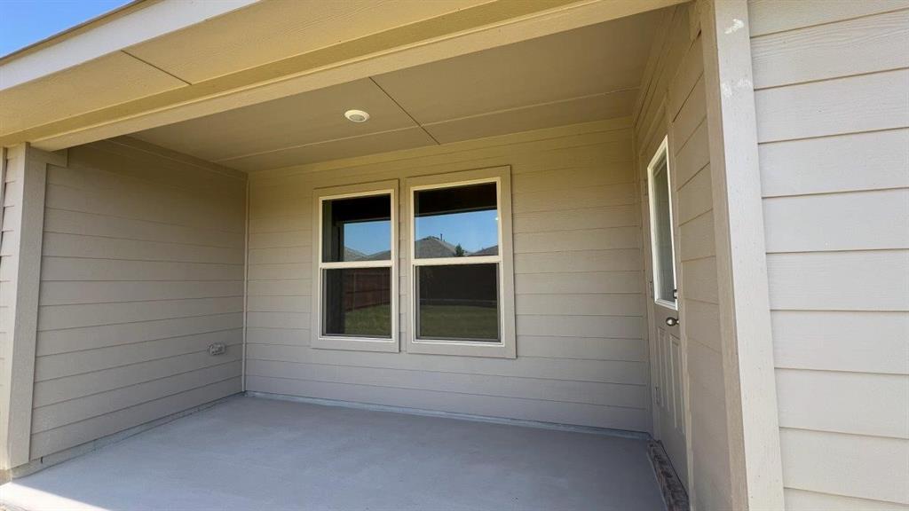 829 Round Robin Lane Rhome, TX 76078 - Photo 26 of 27 a view of empty room with windows