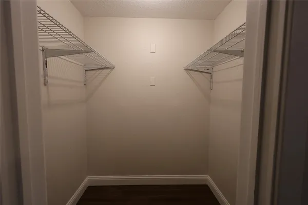 a view of small space with racks on the wall