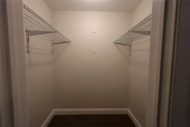 a view of small space with racks on the wall