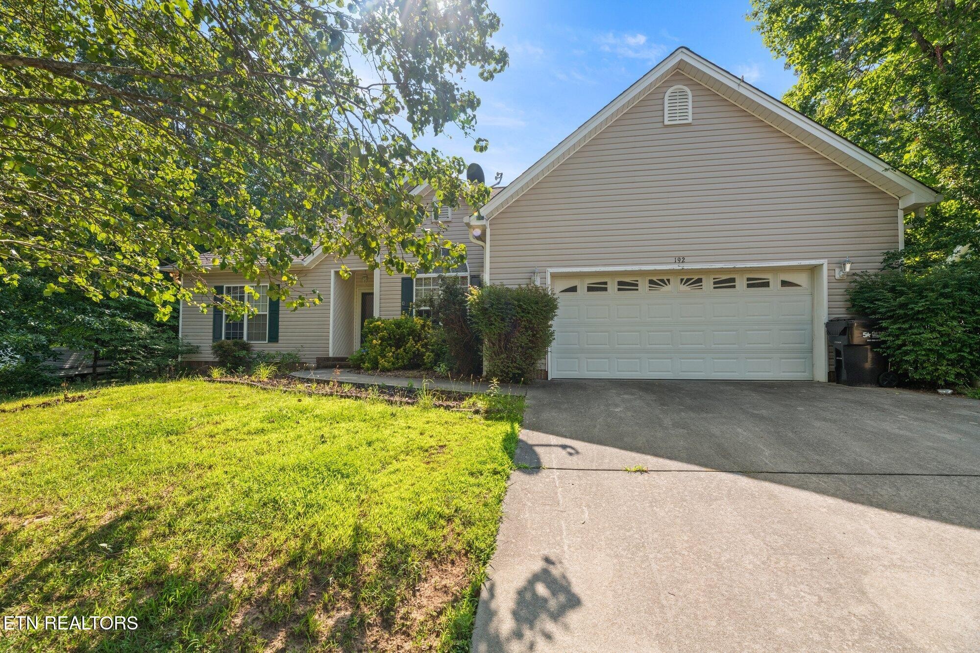 192 Savannah Ridge Trail Cleveland, TN 37323 - Photo 1 of 23 a front view of house along with trees