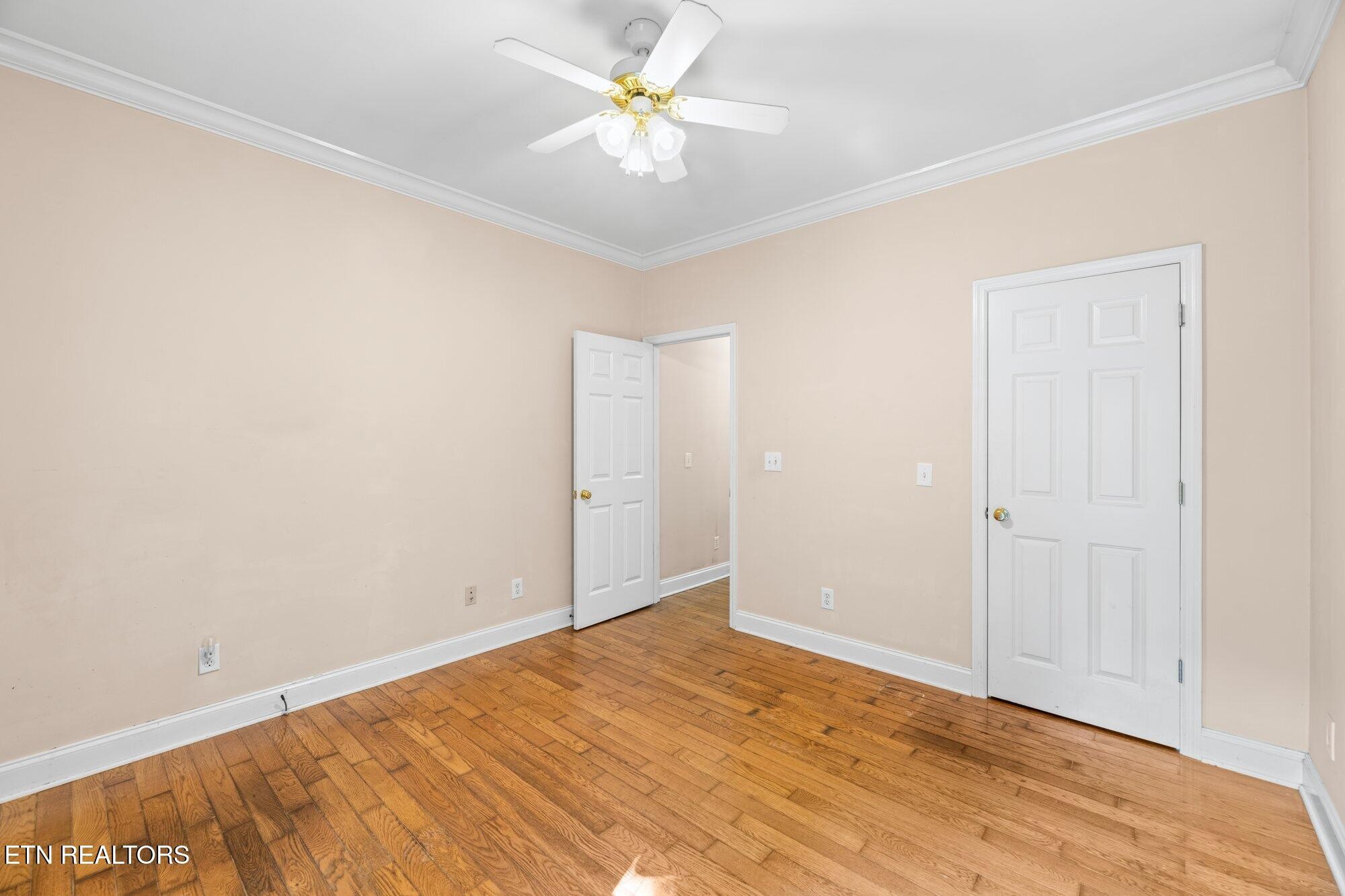 192 Savannah Ridge Trail Cleveland, TN 37323 - Photo 18 of 23 an empty room with a ceiling fan and a window