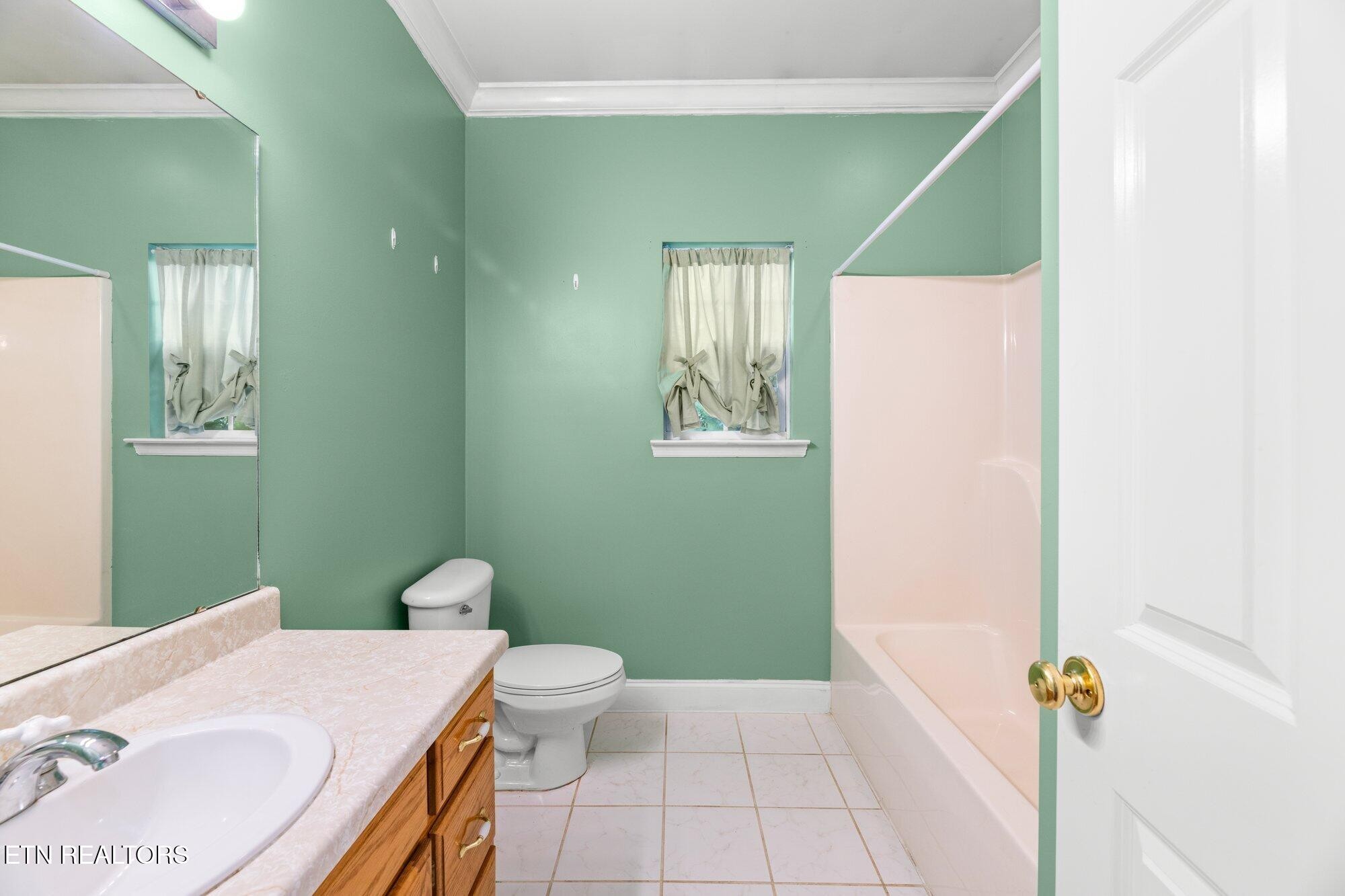 192 Savannah Ridge Trail Cleveland, TN 37323 - Photo 20 of 23 a bathroom with a sink a toilet and shower