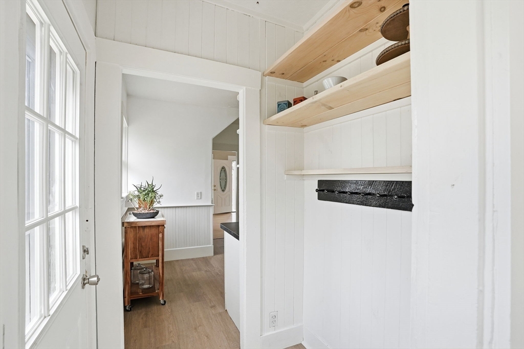 48 Bates Street Hull, MA 02045 - Photo 16 of 42 a view of a hallway with a dining area
