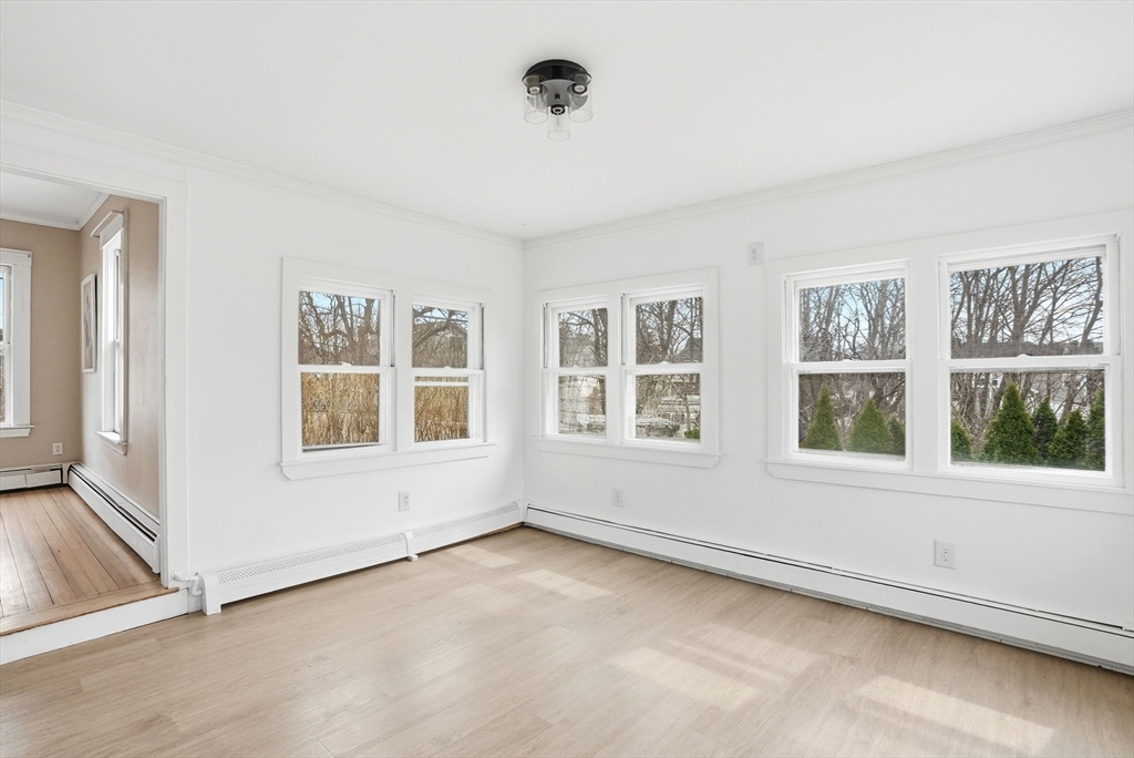 48 Bates Street Hull, MA 02045 - Photo 17 of 42 an empty room with a window
