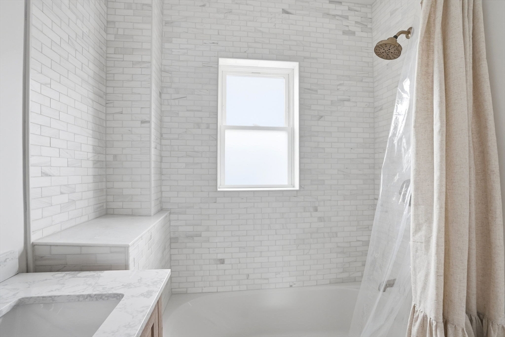 48 Bates Street Hull, MA 02045 - Photo 29 of 42 a bathroom with a shower