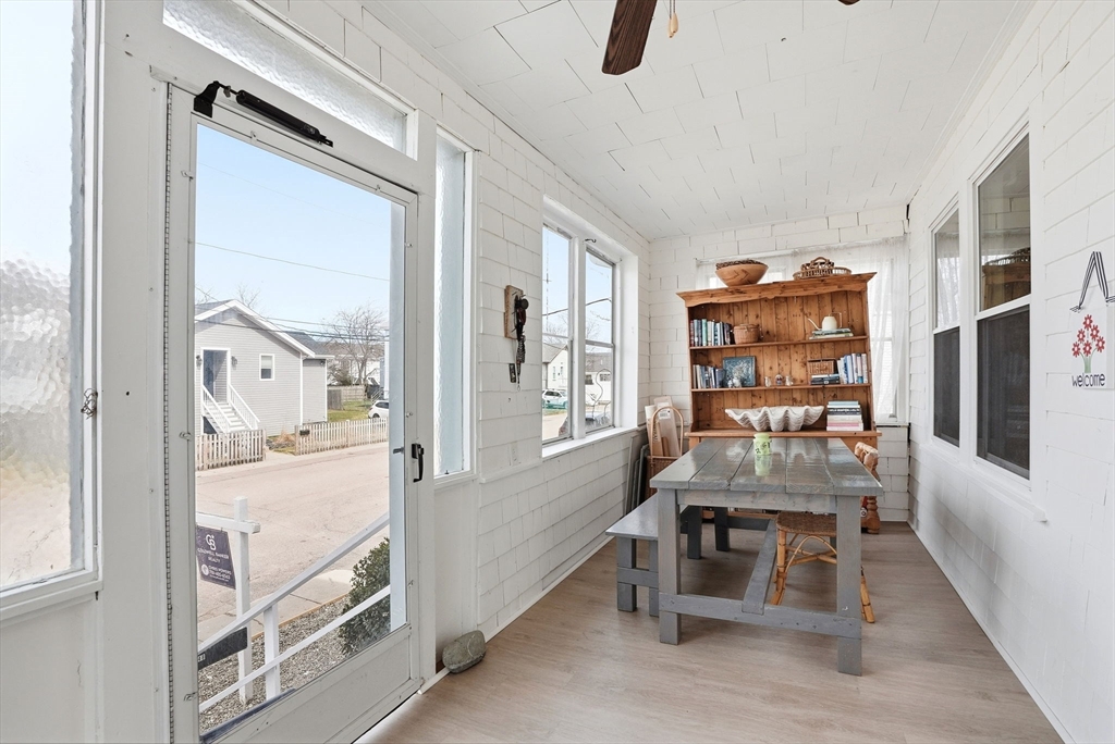 48 Bates Street Hull, MA 02045 - Photo 34 of 42 a dining room with furniture and a window