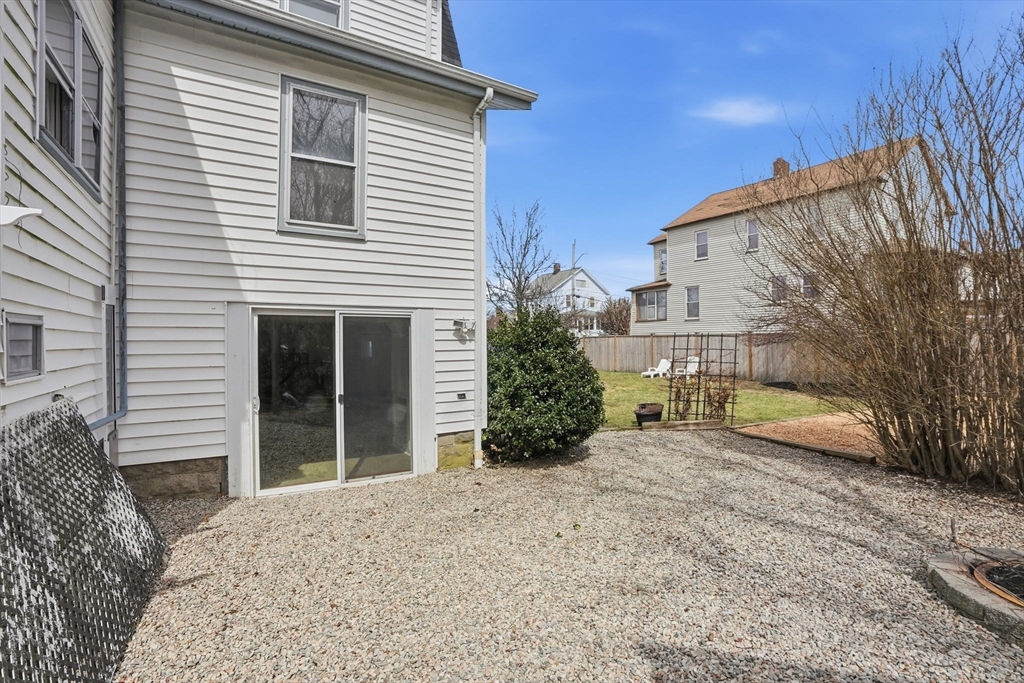 48 Bates Street Hull, MA 02045 - Photo 41 of 42 a view of a house with a yard