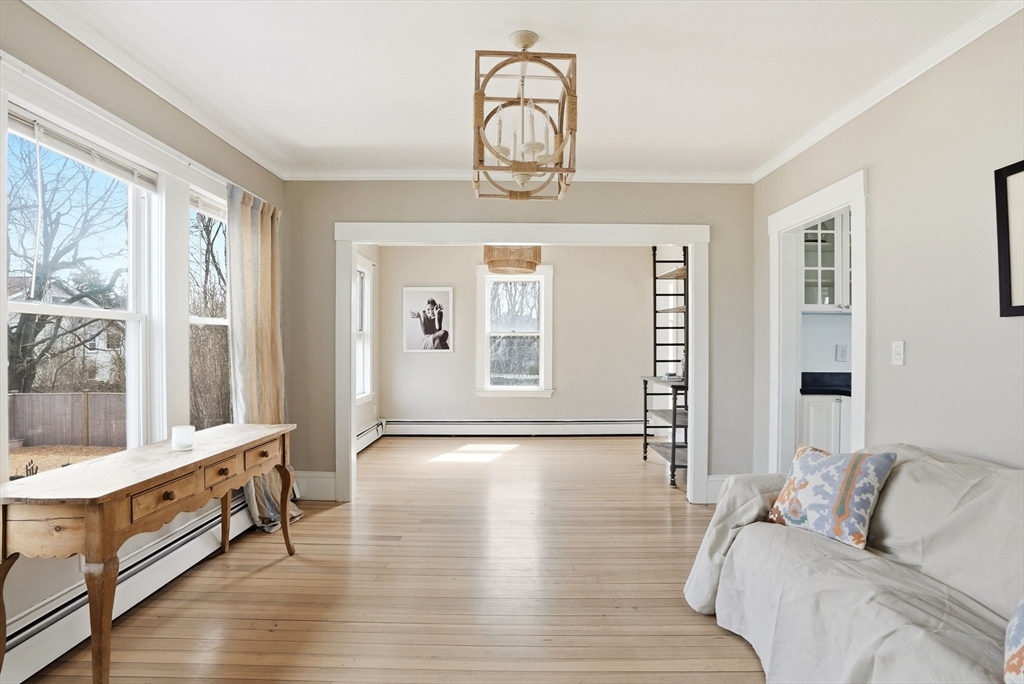 48 Bates Street Hull, MA 02045 - Photo 6 of 42 a living room with furniture and wooden floor