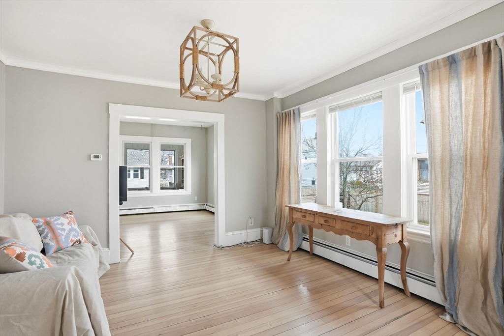 48 Bates Street Hull, MA 02045 - Photo 7 of 42 a view of livingroom with furniture and wooden floor
