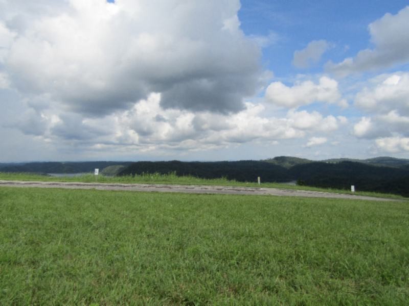 21 East Swan Ridge Road Celina, TN 38551 - Photo 5 of 27 a view of a golf course with a yard