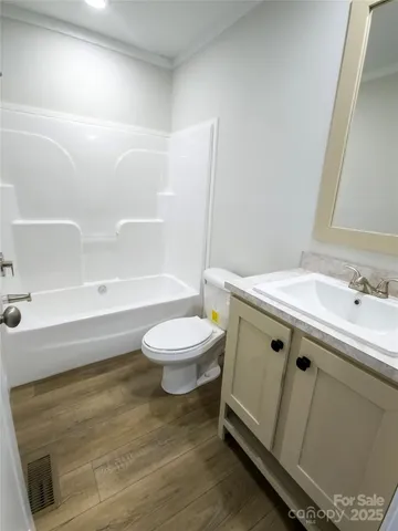 a house view with a garden space