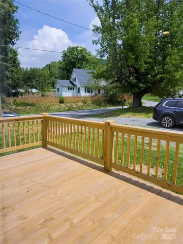 a view of a balcony with an outdoor space